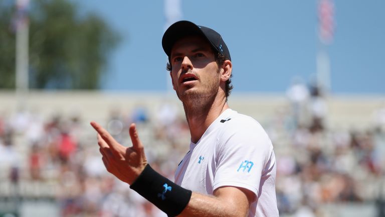 Andy Murray of Great Britain looks dejected during the mens singles second round match against Martin Klizan of Slovakia