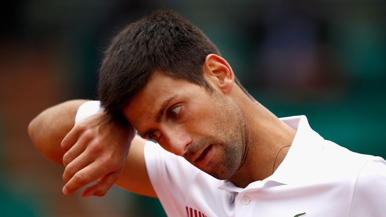 Novak Djokovic of Serbia reacts  during mens singles quarter finals match against Dominic Thiem of Austria