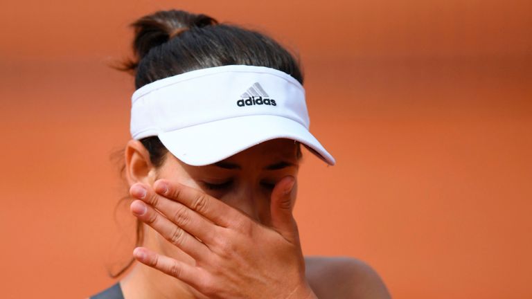 Spain's Garbine Muguruza reacts during her tennis match against France's Kristina Mladenovic at the Roland Garros 2017 French Open on June 4, 2017 in Paris