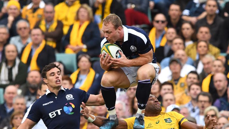 Scotland's Greig Tonks (C) takes the high ball in front ot teammate Lee Jones (L) and Australian player Tevita Kuridrani  (R) in their rugby union Test mat