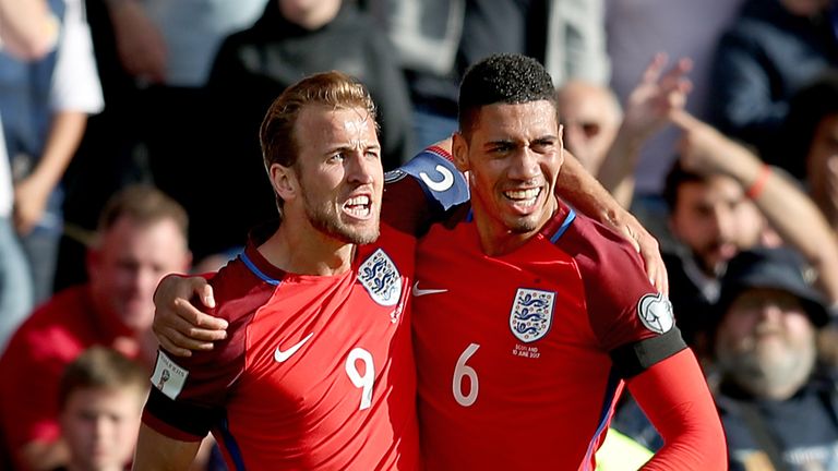 England's Harry Kane (left) celebrates scoring his side's second goal of the game during the 2018 FIFA World Cup qualifying, Group F match at Hampden Park,