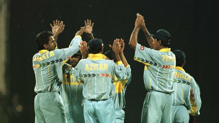 Javagal Srinath of India is congratulated by team-mates after taking the wicket of Aamir Sohail during the match between India and Pakistan