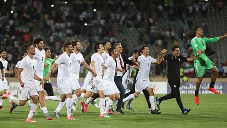 Iran celebrate qualifying for the World Cup