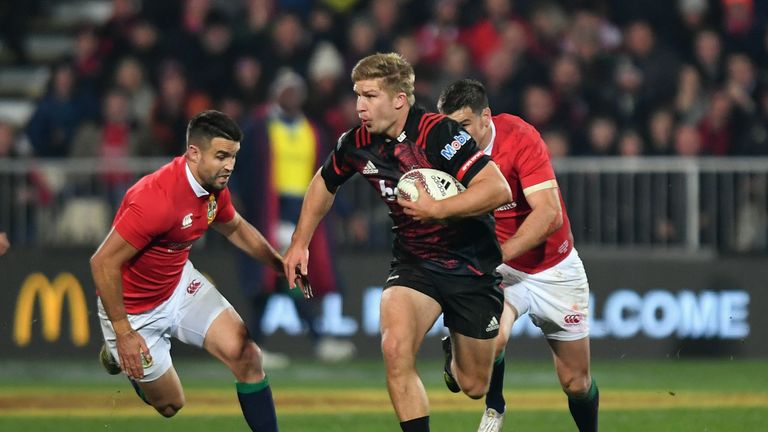 Jack Goodhue of the Crusaders charges forward during the match between the Crusaders and the British & Irish Lions 