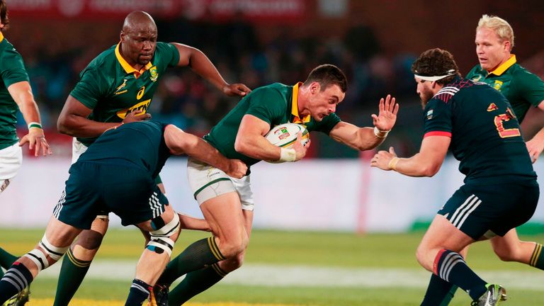 Jesse Kriel of South Africa (C) breaks through during the first rugby union Test match between South Africa and France at the Loftus Versfeld Arena in Pret