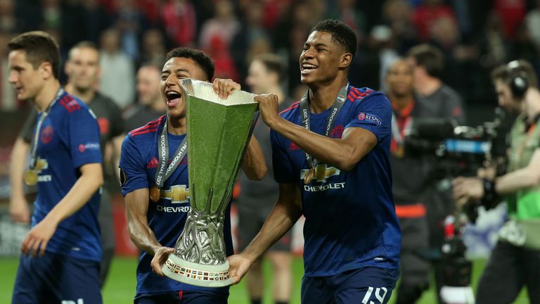 Jesse Lingard (L) and Marcus Rashford  celebrate Manchester United's Europa League win