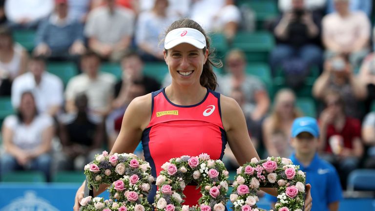 Great Britain's Johanna Konta poses for a photo after completing her 300th tour victory