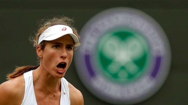 Britain's Johanna Konta celebrates a point against Puerto Rico's Monica Puig during their women's singles first round match 