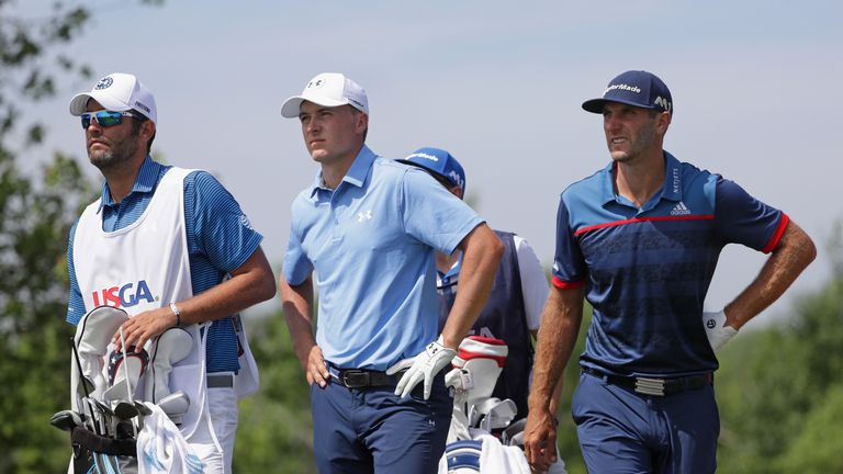 HARTFORD, WI - JUNE 15:  Jordan Spieth of the United States (C) and Dustin Johnson of the United States prepare for their shots from the 17th tee during th