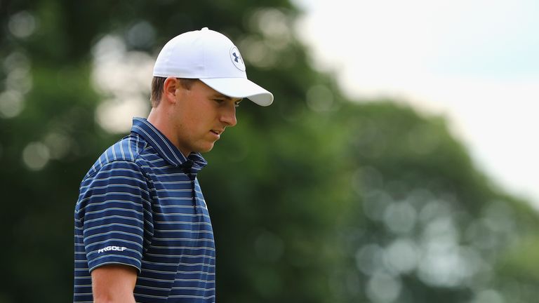 Jordan Spieth of the United States reacts to his putt on the ninth green during the final round of the Travelers Championship 