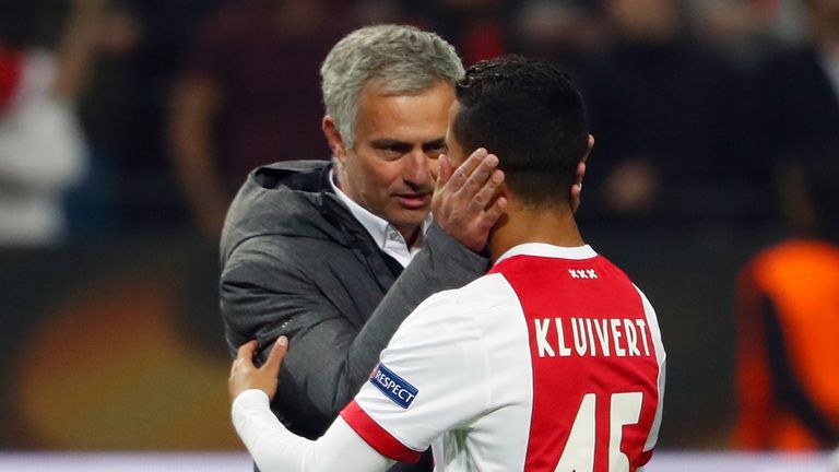 Manchester United's Portuguese manager Jose Mourinho (L) spaeks with Ajax Dutch forward Justin Kluivert after the UEFA Europa League final football match A