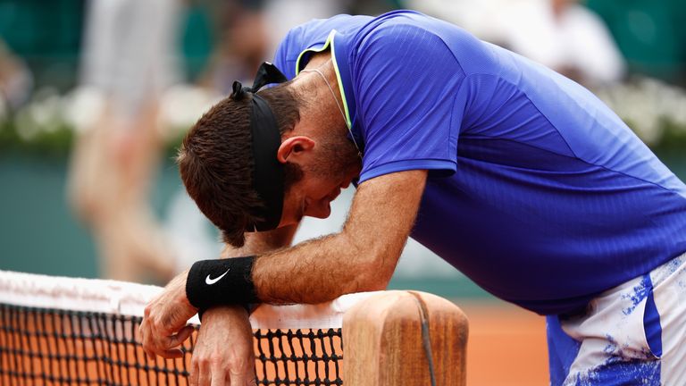 PARIS, FRANCE - JUNE 03:  Juan Martin Del Potro of Argentina reacts on the net in his men's singles third round match against Andy Murray of Great Britain 