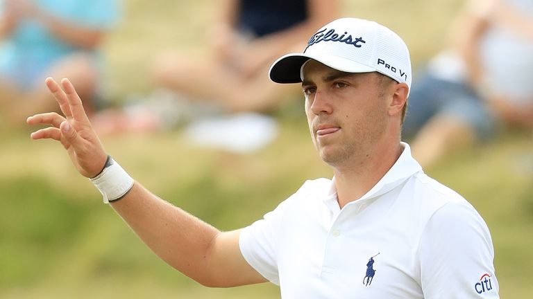 HARTFORD, WI - JUNE 17:  Justin Thomas of the United States reacts after making a birdie on the 17th green during the third round of the 2017 U.S. Open at 