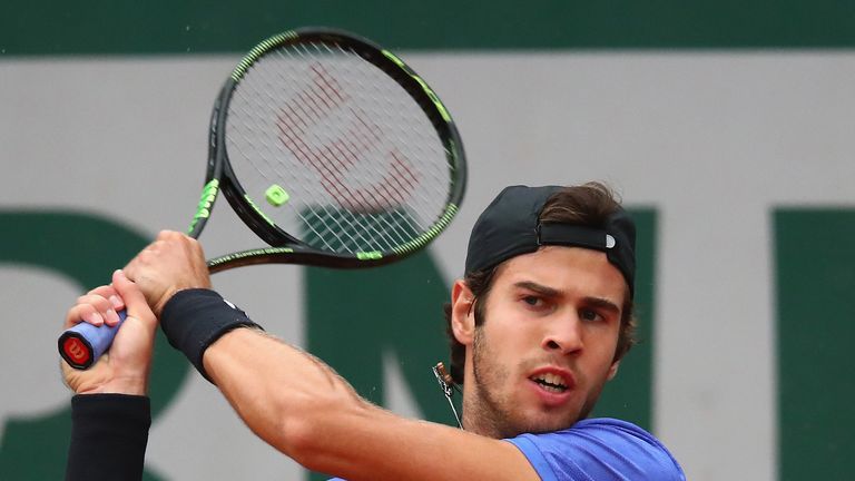 PARIS, FRANCE - JUNE 03: Karen Khachanov of Russia plays a backhand during the mens singles third round match against John Isner of The United States on da