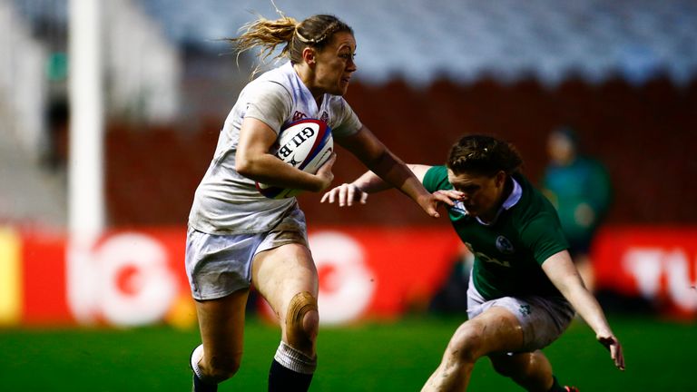 LONDON, ENGLAND - NOVEMBER 14:  Katie Mason of England is tackled by Mairead Coyne of Ireland during the Women's International match between England v Irel