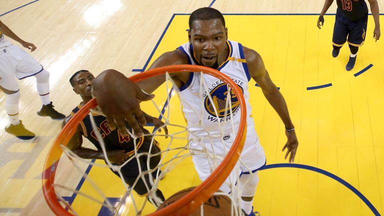 OAKLAND, CA - JUNE 01:  Kevin Durant #35 of the Golden State Warriors dunks the ball against the Cleveland Cavaliers in Game 1 of the 2017 NBA Finals at OR