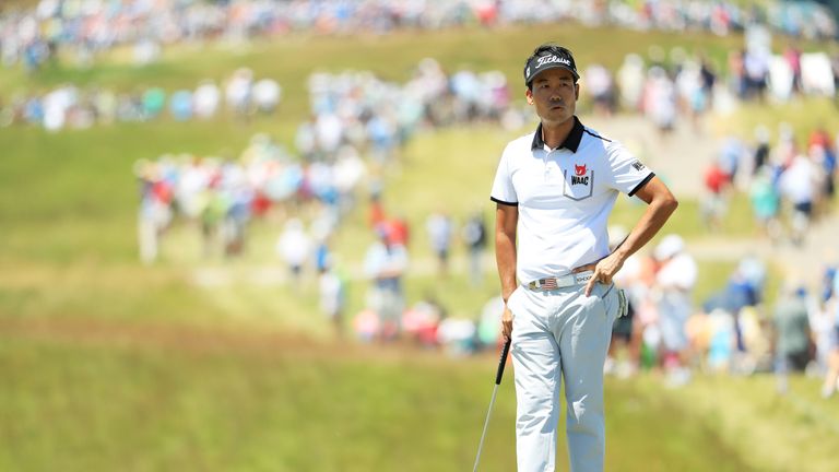 HARTFORD, WI - JUNE 16:  Kevin Na of the United States stands on the 18th green during the second round of the 2017 U.S. Open at Erin Hills on June 16, 201