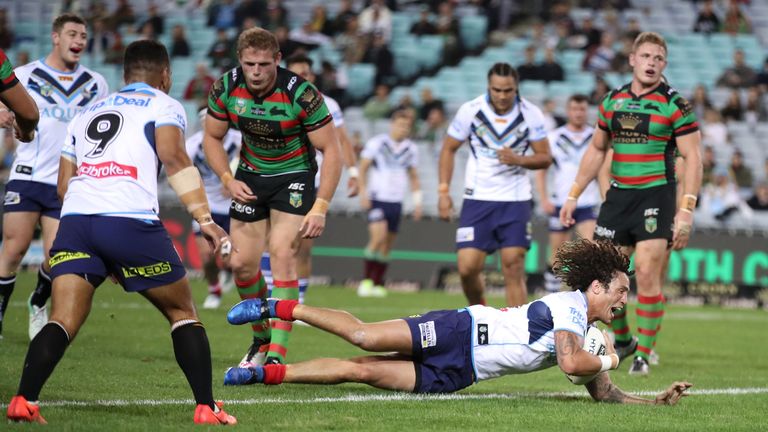 SYDNEY, AUSTRALIA - JUNE 16:  Kevin Proctor of the Titans scores a try during the round 15 NRL match between the South Sydney Rabbitohs and the Gold Coast 