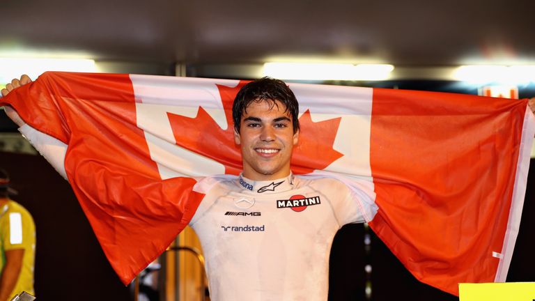 BAKU, AZERBAIJAN - JUNE 25:  Lance Stroll of Canada and Williams celebrates his first podium and finishing in third place during the Azerbaijan Formula One