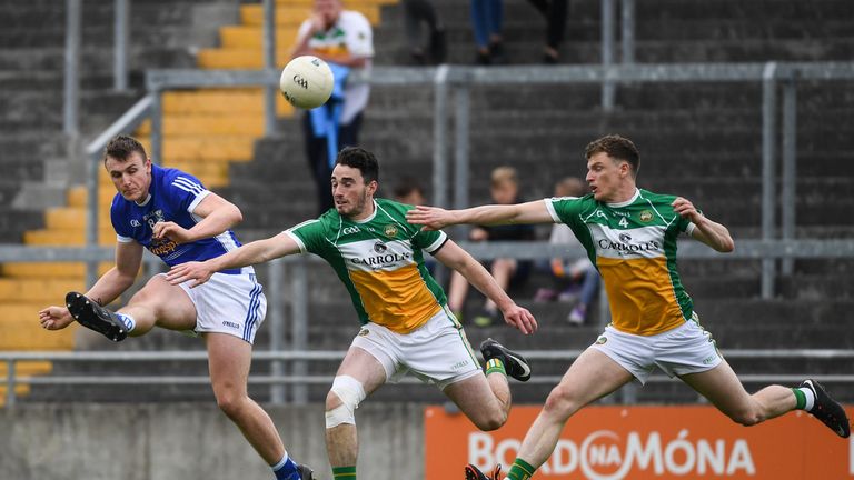 Liam Buchanan of Cavan in action against Sean Pender of Offaly during the Football All-Ireland Senior Championship Round 1B match