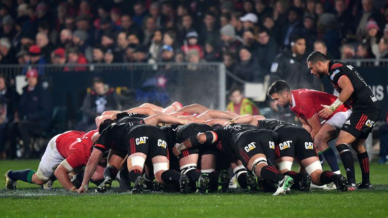 Lions' Conor Murray (2nd-R) feeds in the scrum ball with Crusaders' Bryn Hall (R) during the rugby union match between the Crusaders and the British and Ir