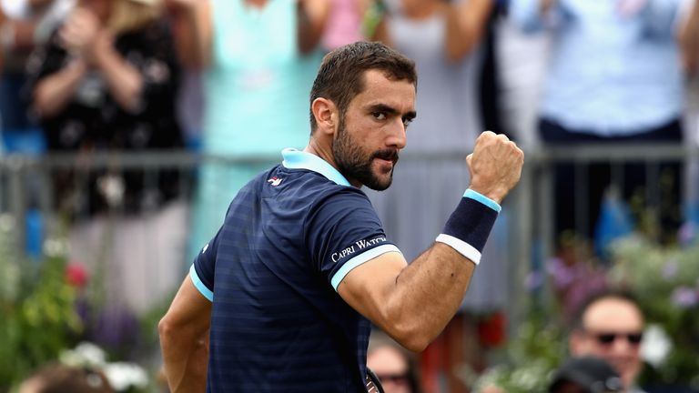 Marin Cilic of Croatia celebrates during the mens singles Quarter final match against Donald Young of The United States