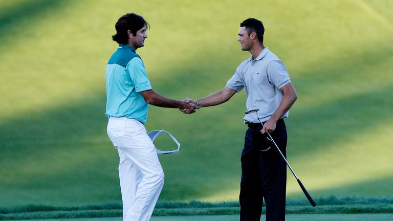 KOHLER, WI - AUGUST 15:  Martin Kaymer of Germany (R) shakes hands with Bubba Watson (L) on the 18th green after defeating Watson during the three-hole agg