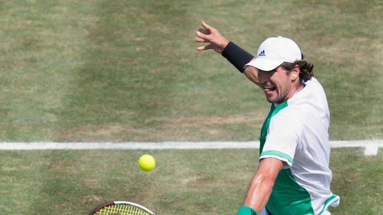 Germany's Mischa Zverev returns the ball to fellow countryman Yannick Hanfmann (not in picture) in their round of sixteen match at the ATP Mercedes Cup ten