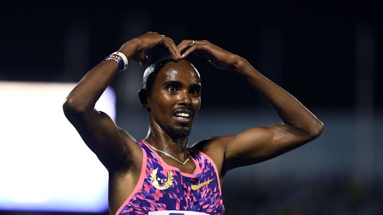 Mo Farah of Britain celebrates after crossing the finish line to win 3000m race during the Racers Grand Prix at the national stadium in Kingston, Jamaica, 