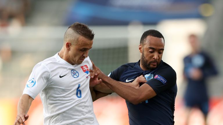 Slovakia's Stanislav Lobotka (left) and England's Nathan Redmond battle for the ball during the UEFA European Under-21 Championship, Group A match at the K