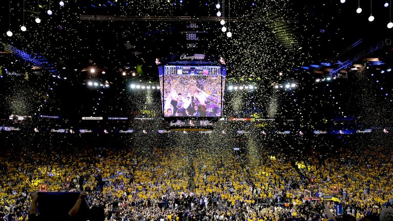 The Golden State Warriors celebrate after defeating the Cleveland Cavaliers 129-120 in Game 5 to win the 2017 NBA Finals