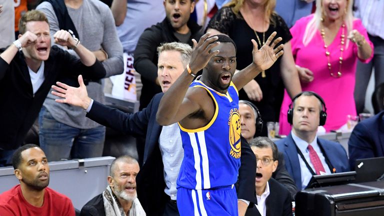 Steve Kerr and Draymond Green #23 of the Golden State Warriors react to a call going against them