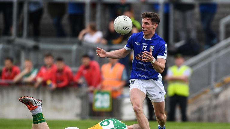 Niall Clerkin of Cavan in action against Peter Cunningham of Offaly during the All-Ireland Senior Championship Round 1B match between Offaly and Cavan