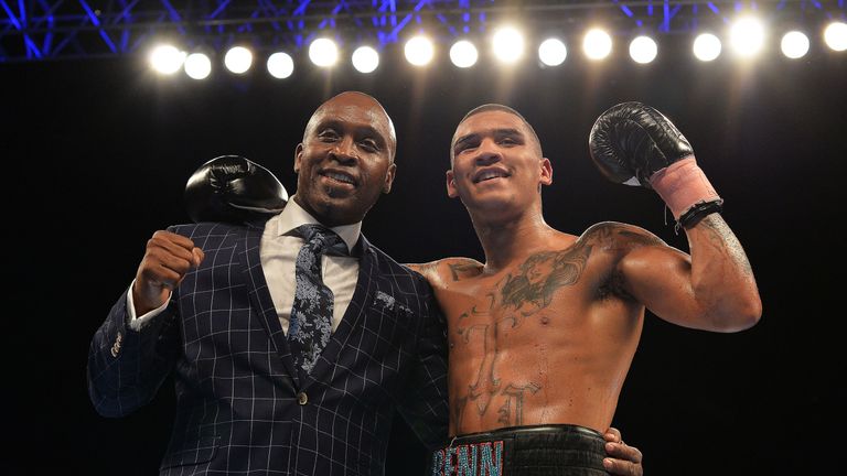 Conor Benn celebrates with his father Nigel Benn after beating Luke Keleher