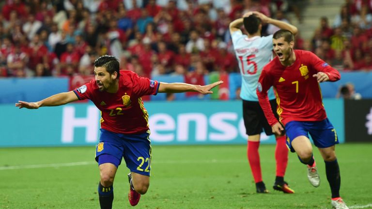 Spain's forward Nolito (L) celebrates after scoring during the Euro 2016 group D football match between Spain and Turkey at the Allianz Riviera stadium in 