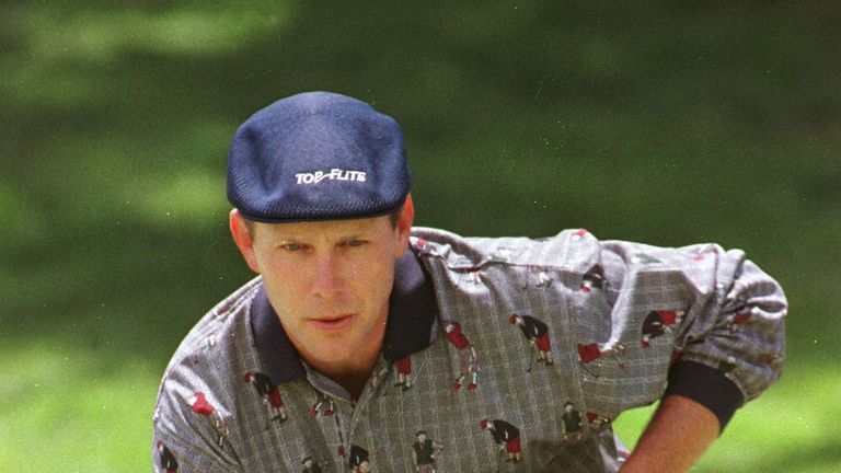 US Open leader Payne Stewart lines up a putt on the third hole