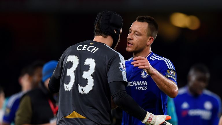 LONDON, ENGLAND - JANUARY 24:  John Terry of Chelsea speaks with Petr Cech of Arsenal after the Barclays Premier League match between Arsenal and Chelsea a