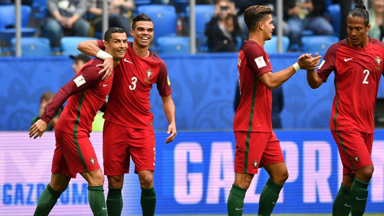 Portugal's forward Cristiano Ronaldo (L) celebrates with Portugal's defender Pepe after scoring a penalty during the 2017 Confederations Cup group A footba