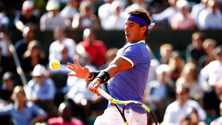 Rafael Nadal plays a forehand during his French Open semi-final match against Dominic Thiem at Roland Garros