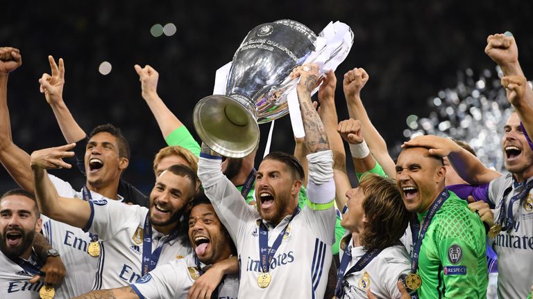 CARDIFF, WALES - JUNE 03:  Sergio Ramos of Real Madrid lifts The Champions League trophy after the UEFA Champions League Final between Juventus and Real Ma