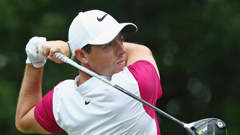 Rory McIlroy of Northern Ireland plays his shot from the 14th tee during the second round of the Travelers Championship