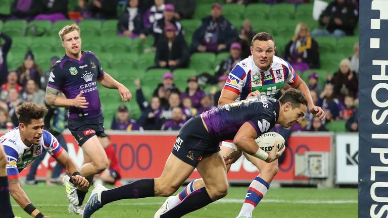 Billy Slater dives over to score against Newcastle Knights