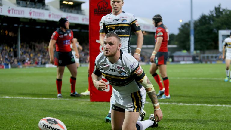 Leeds Rhino's Brad Singleton scores his try during the Ladbrokes Challenge Cup, quarter-final match at Headingley Carnegie Stadium, Leeds.