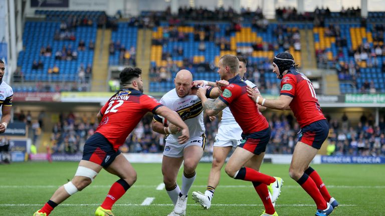 Leeds Rhinos' Carl Ablett powers through the Featherstone defence during the Ladbrokes Challenge Cup, quarter-final match at Headingley Carnegie Stadium