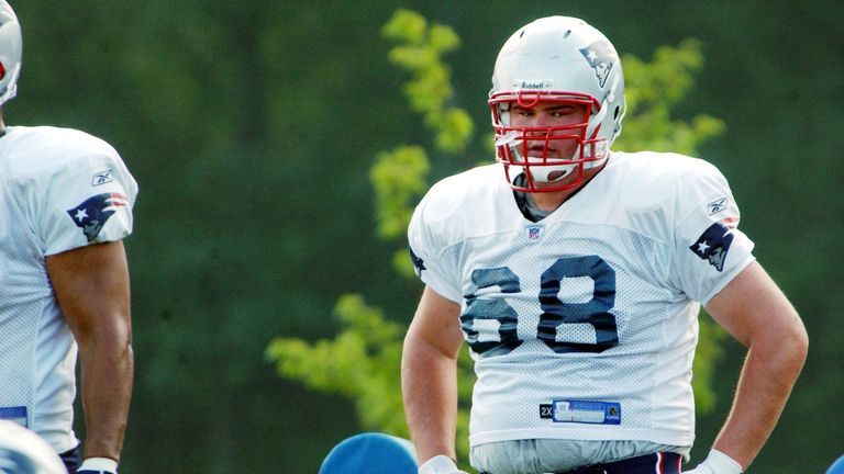 Ryan O'Callaghan works out during a summer training camp practice