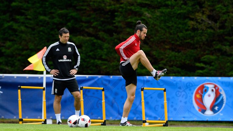 Wales player Gareth Bale warms up with fitness coach Ryland Morgans during Wales training ahead of their UEFA Euro 2016 semi fin