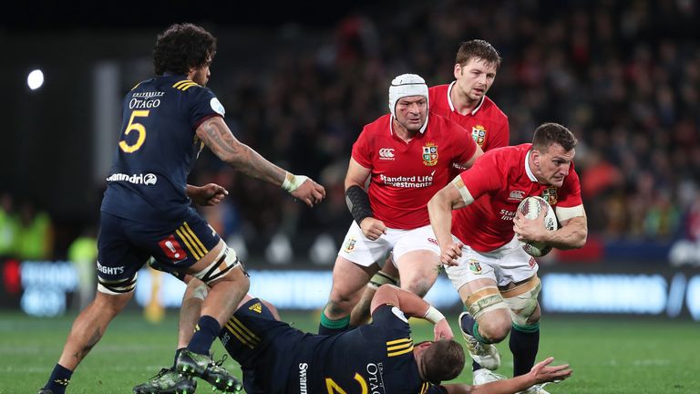 Sam Warburton breaks through a tackle during the tour match against the Highlanders
