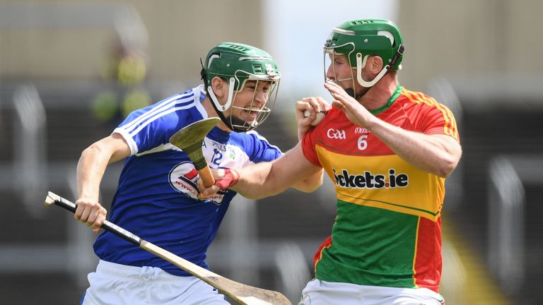 Sean Downey of Laois is tackled by David English of Carlow during the GAA Hurling All-Ireland Senior Championship Preliminary Round match