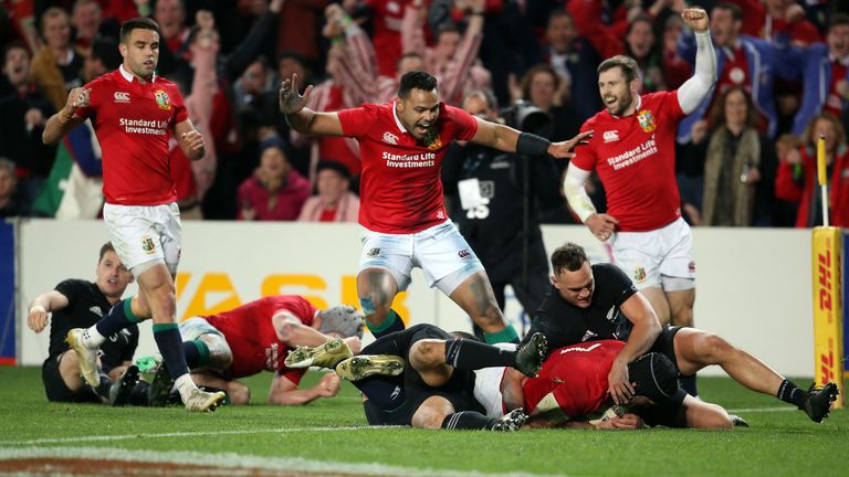 British and Irish Lions Sean O'Brien (R) dives over to score a try during their Test match between New Zealand