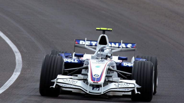 INDIANAPOLIS - JUNE 17:  Sebastian Vettel of Germany and BMW Sauber races during the F1 Grand Prix of USA at the Indianapolis Motor Speedway on June 17, 20